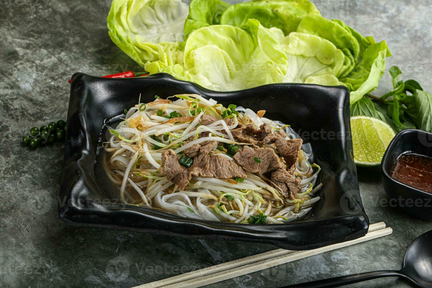 Vietnamese traditional soup Pho Bo with beef photo