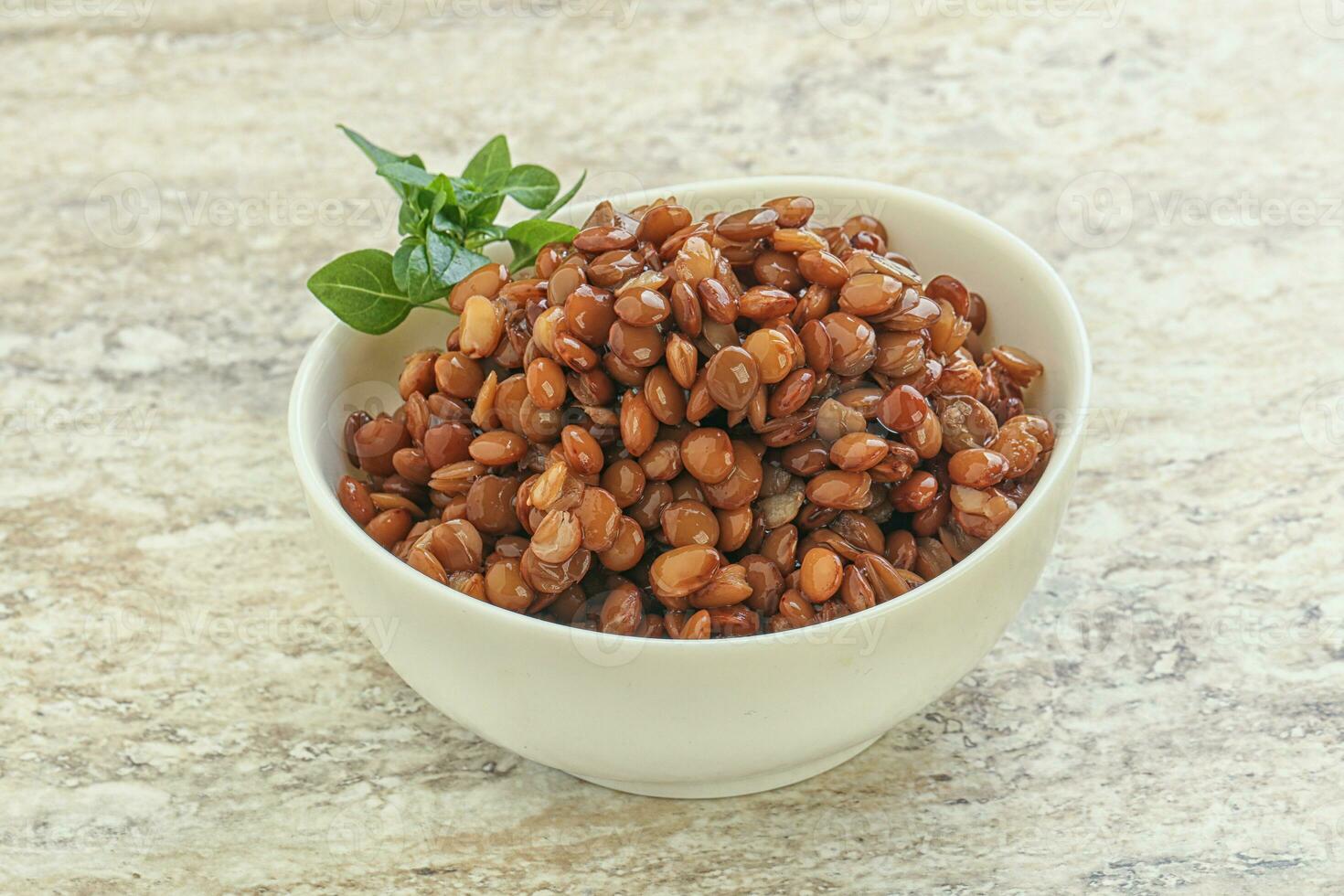 Boiled lentil in the bowl photo