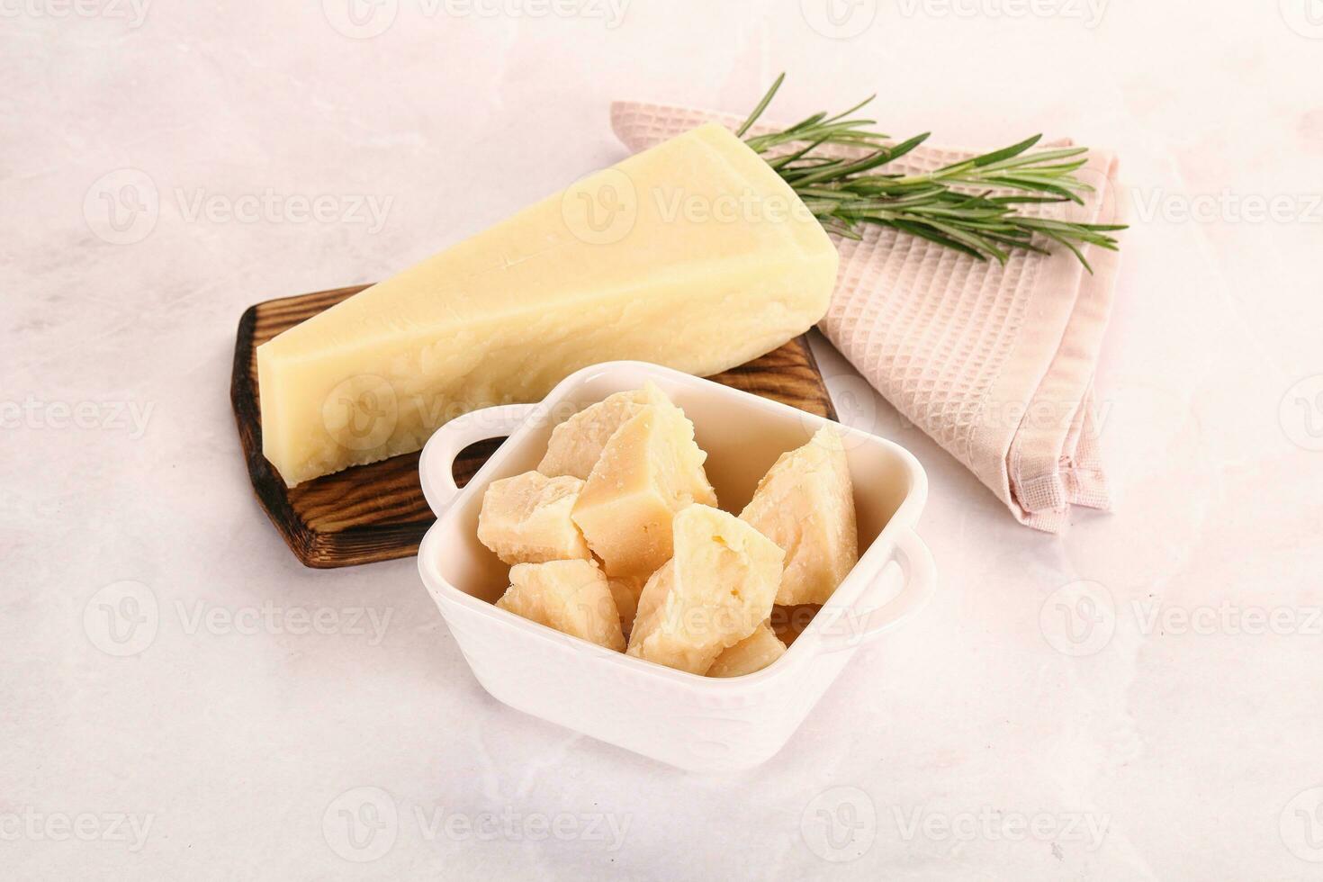 Chopped Italian hard parmesan cheese photo