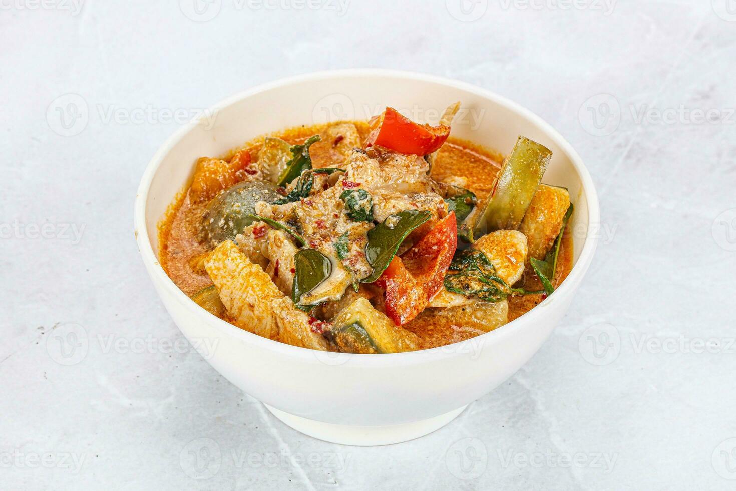 Thai red spicy curry with chicken photo