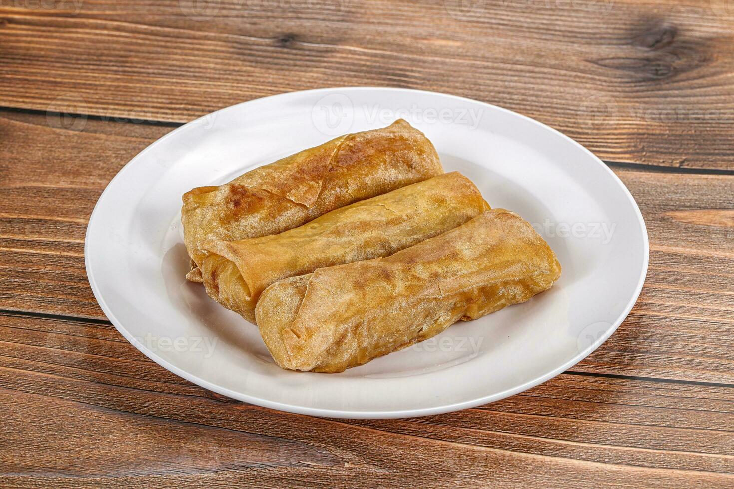 Traditional crispy fried stuffed springroll photo