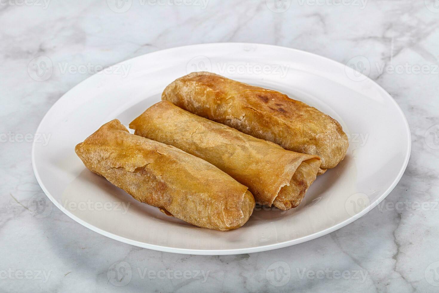 Traditional crispy fried stuffed springroll photo