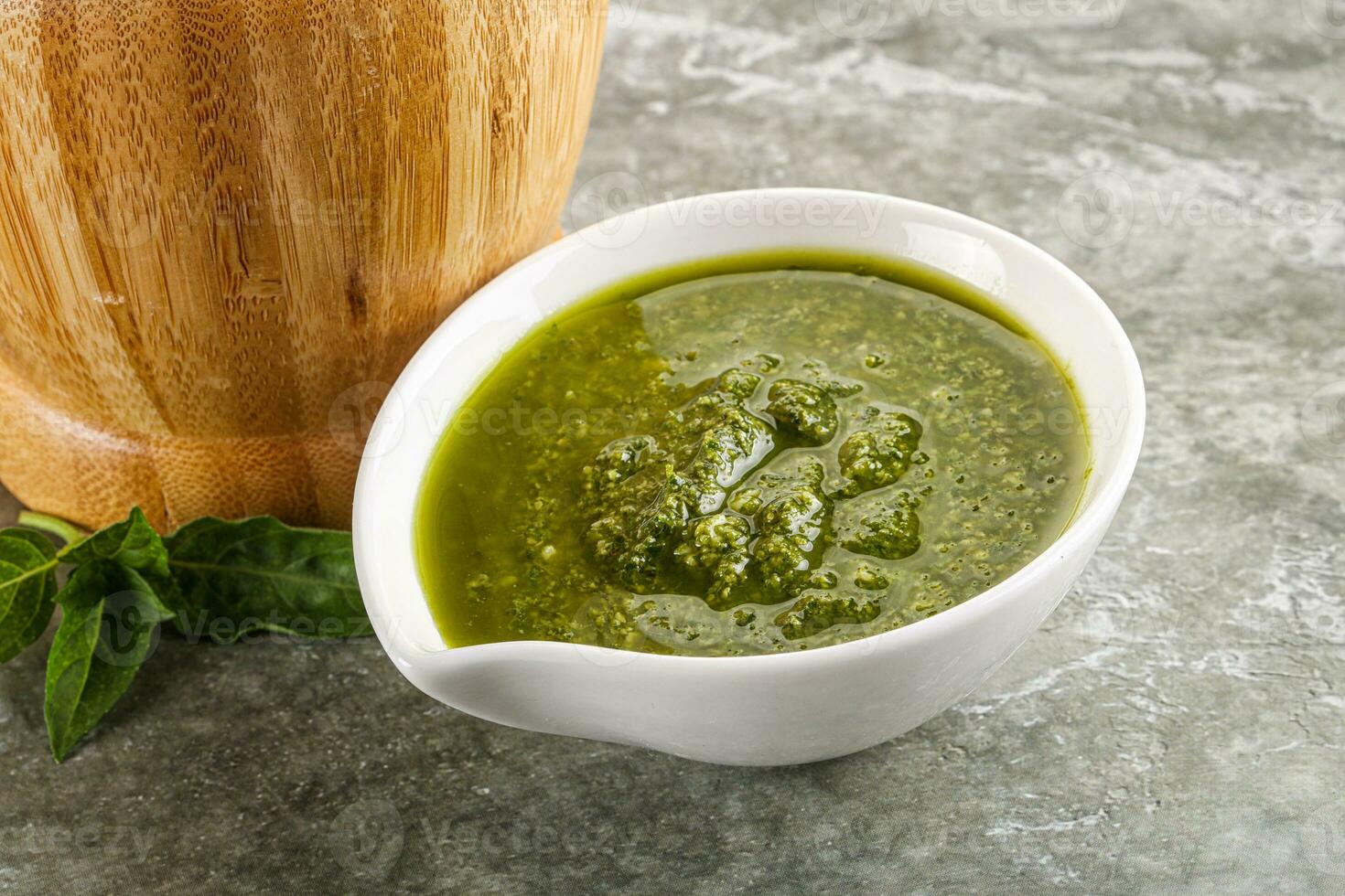 Homemade vegetarian basil pesto sauce photo