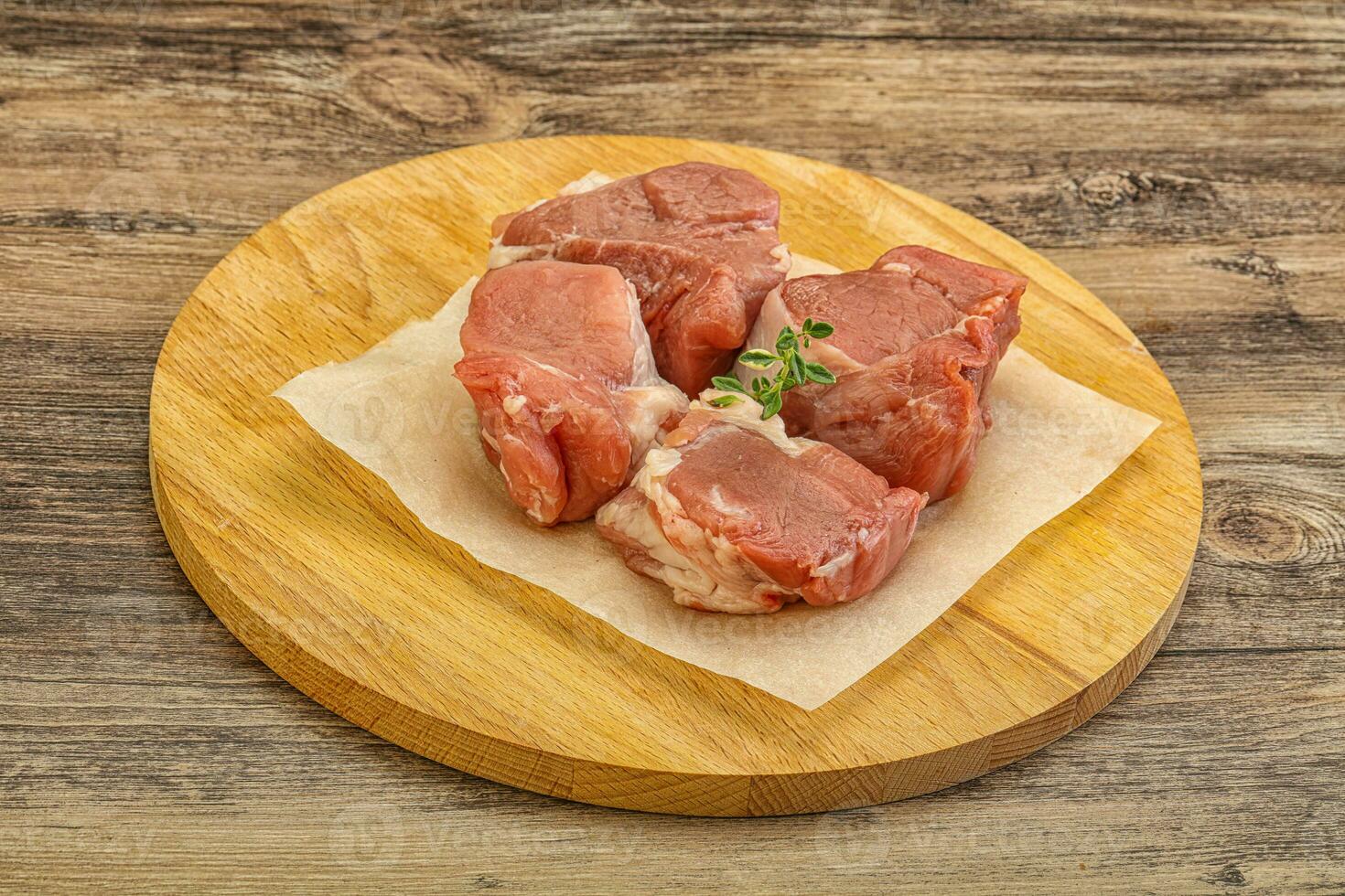 Raw pork tenderloin for cooking photo