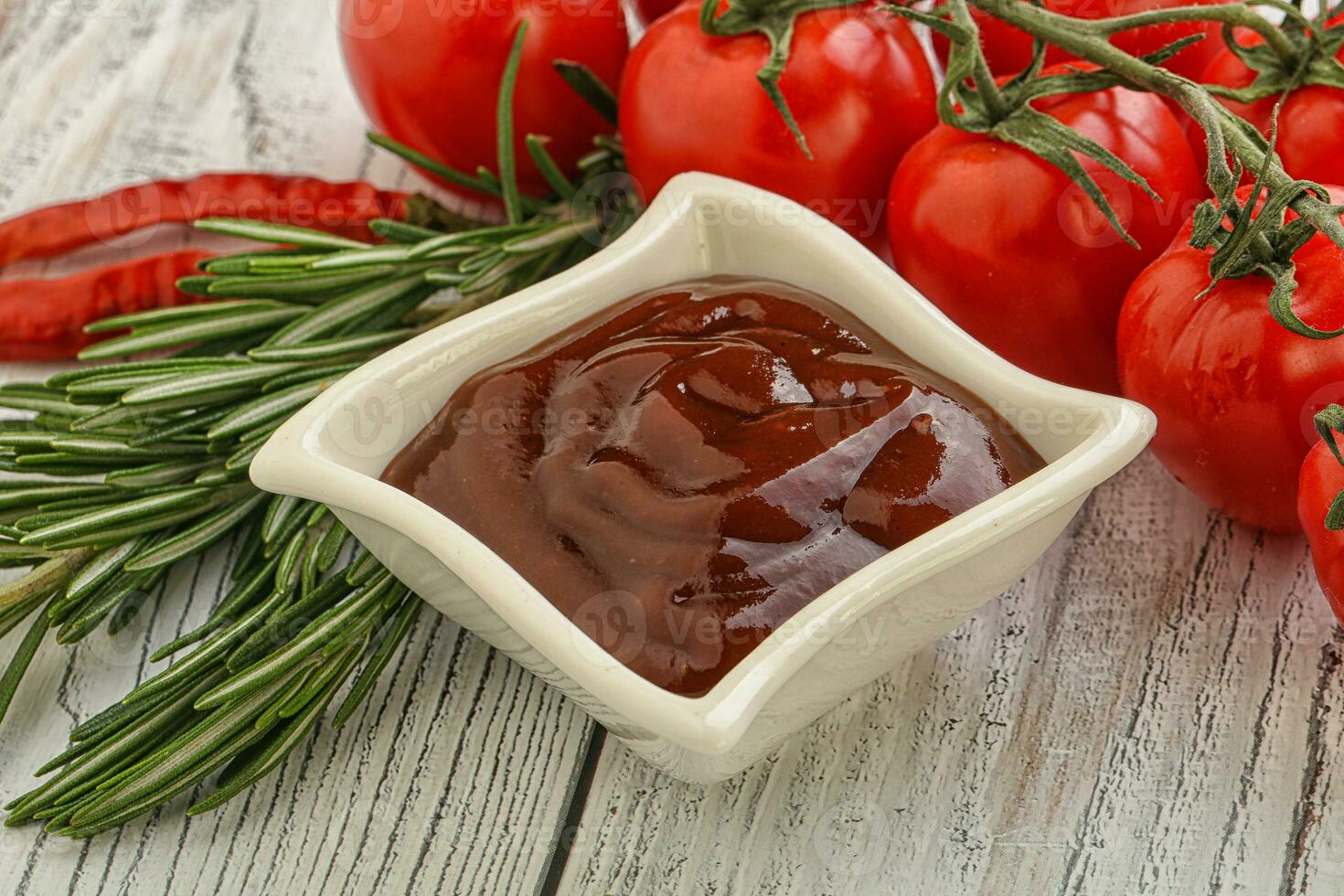 Tomato barbecue sauce on the bowl photo