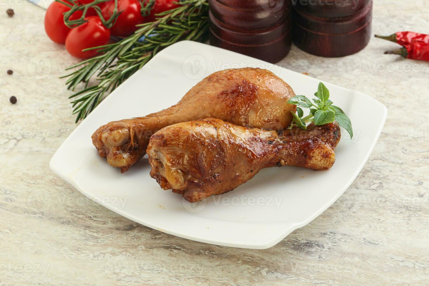 Roasted chicken legs with spicy sauce photo