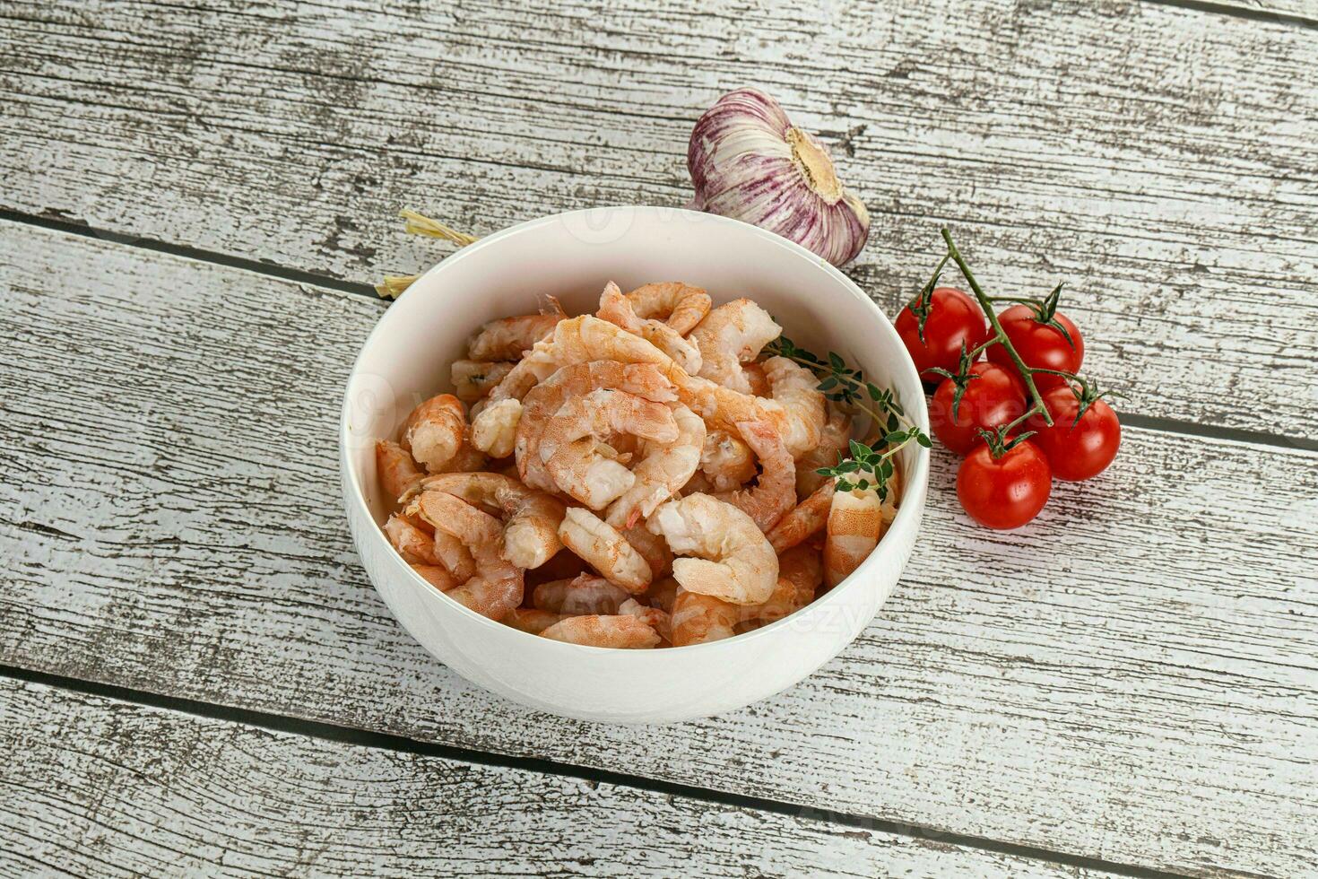 Raw peeled prawn in the bowl photo