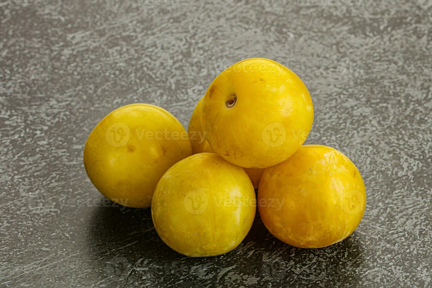 Yellow sweet plum heap fruit photo