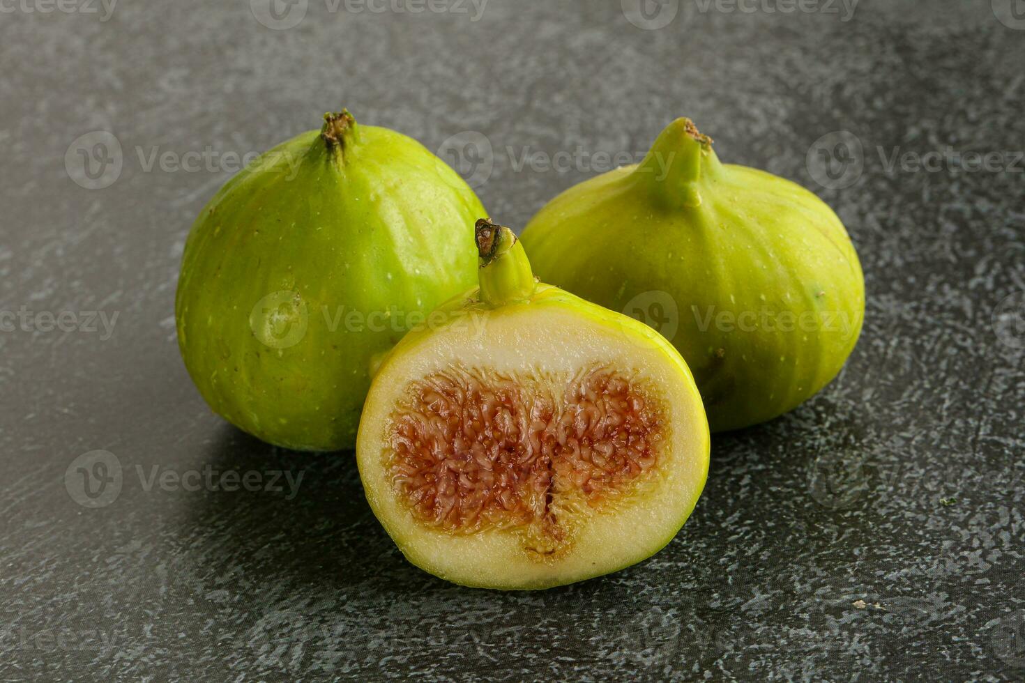 Ripe sweet juicy green fig heap photo