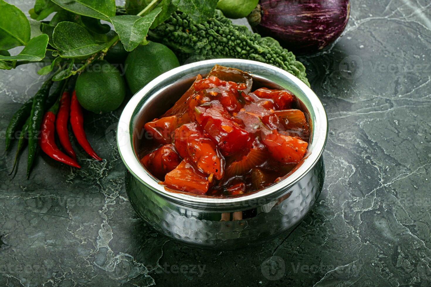 Chinese cuisine - chicken in sweet and sour sauce photo