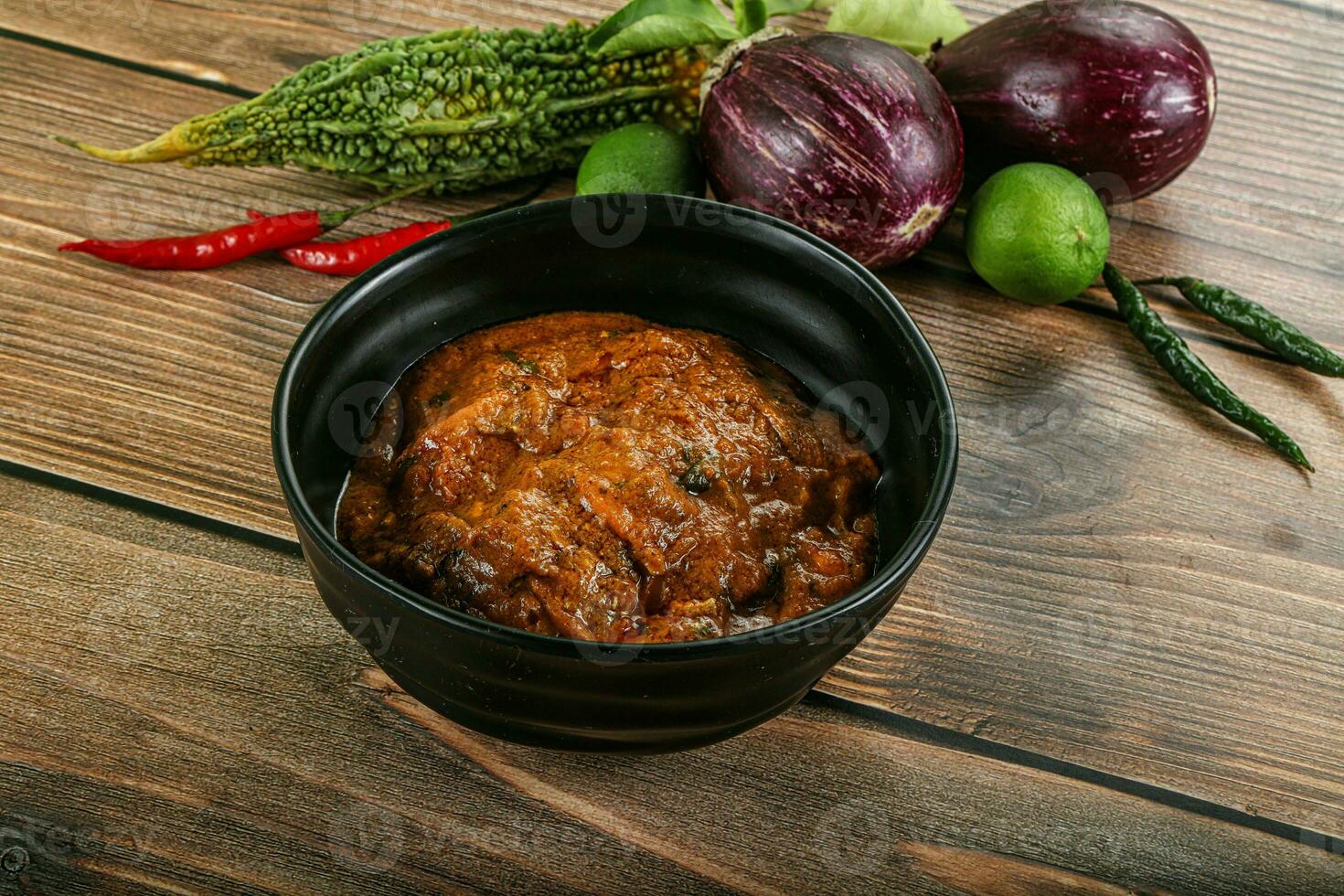 indio cocina - pollo condimento salsa foto