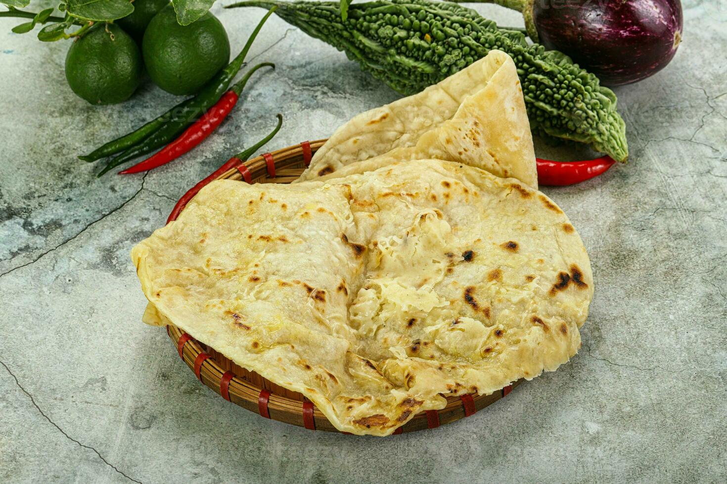 Indian tandori bread - naan with cheese photo