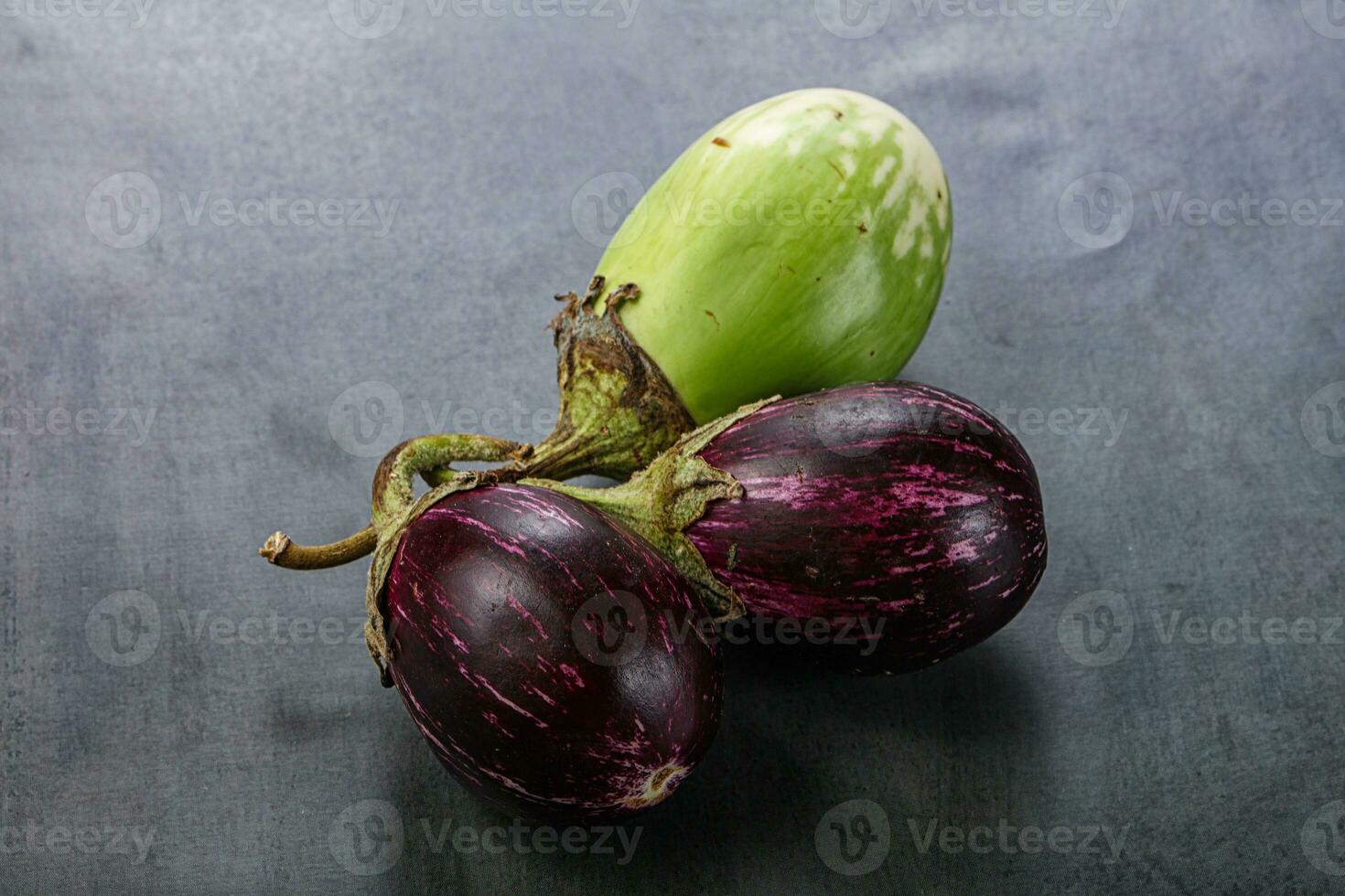 Heap of raw asian baby eggplant photo