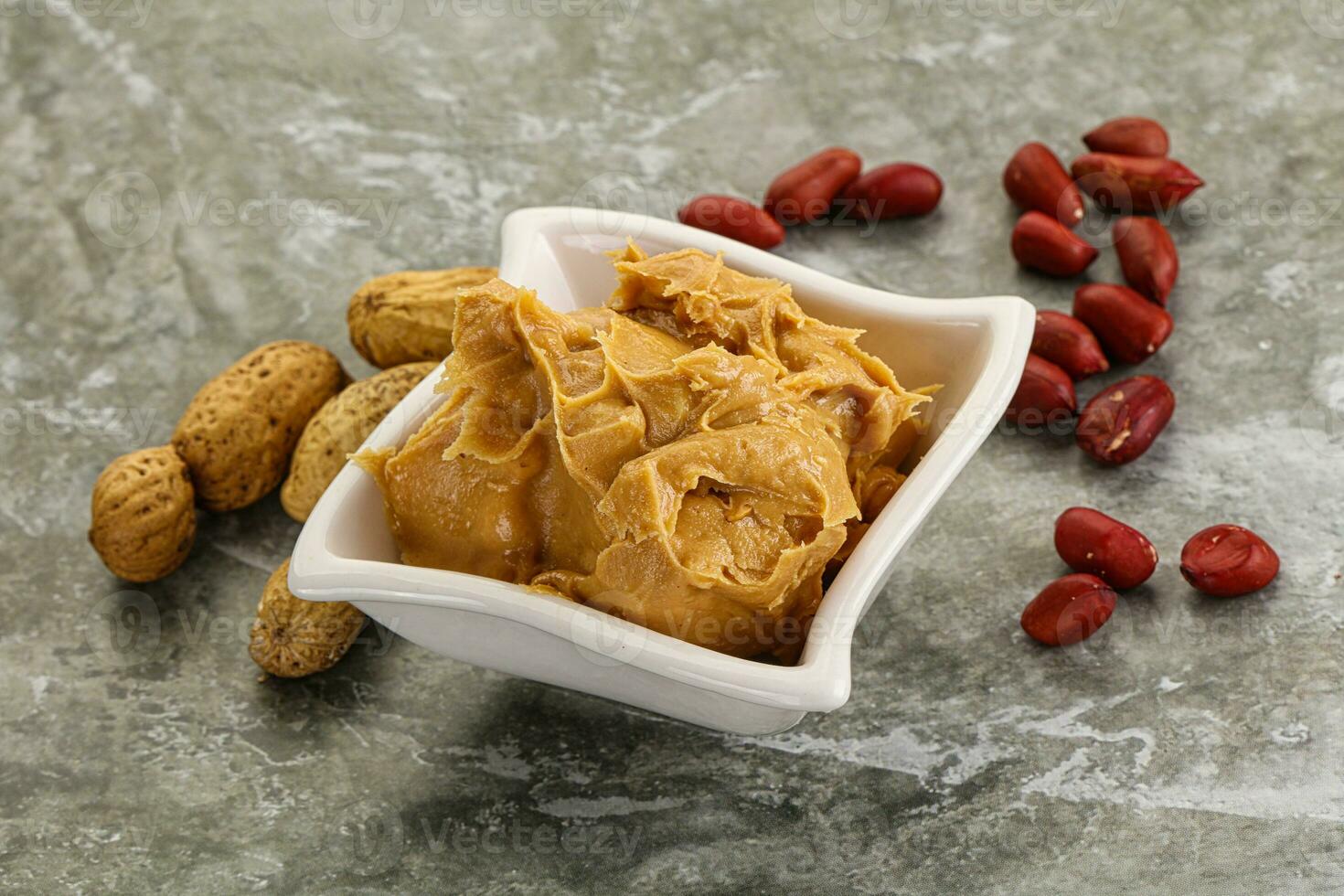 Peanut paste in the bowl photo