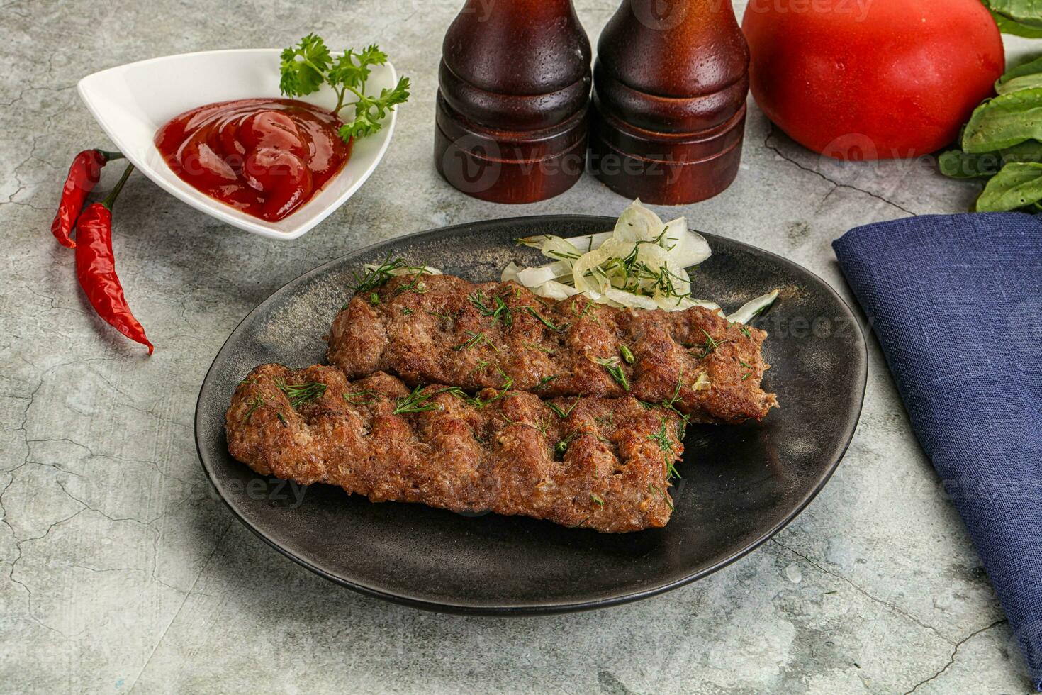 Kebab with beef served onion photo