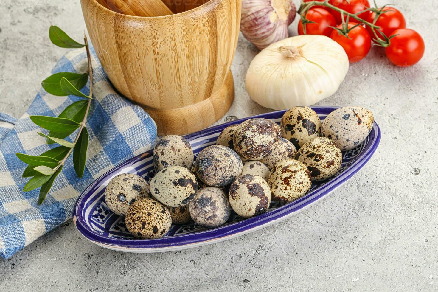 Raw quail eggs in the bowl photo