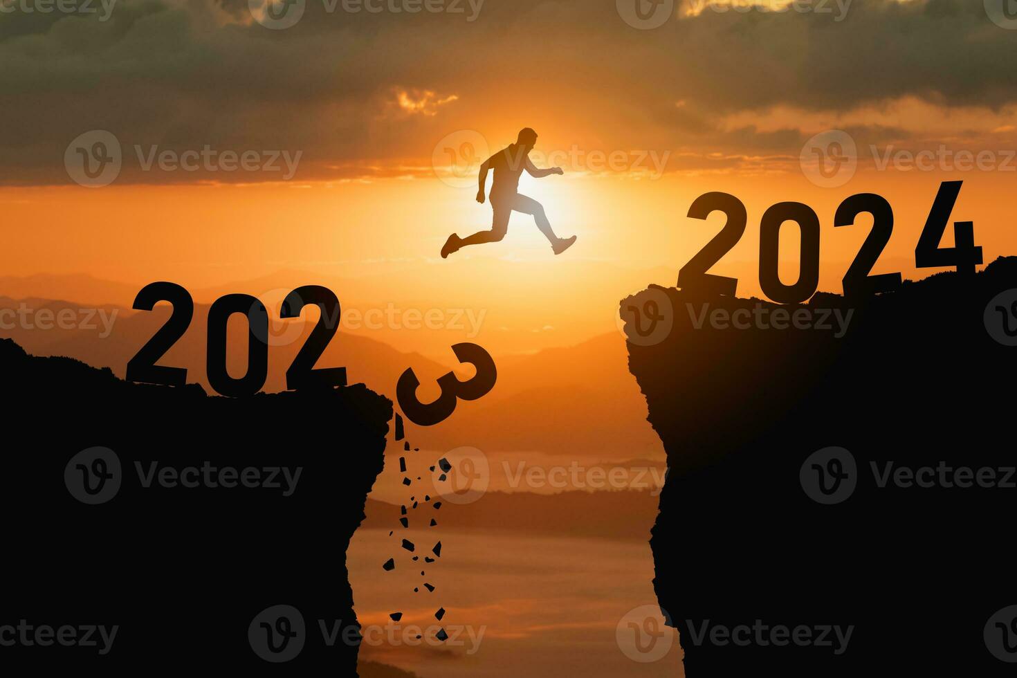 Silhouette man jump happy new year 2024 concept, man jumping over barrier cliff and success from 2023 cliff to 2024 cliff with sunset background. Happy New Year for web banner and advertisement. photo