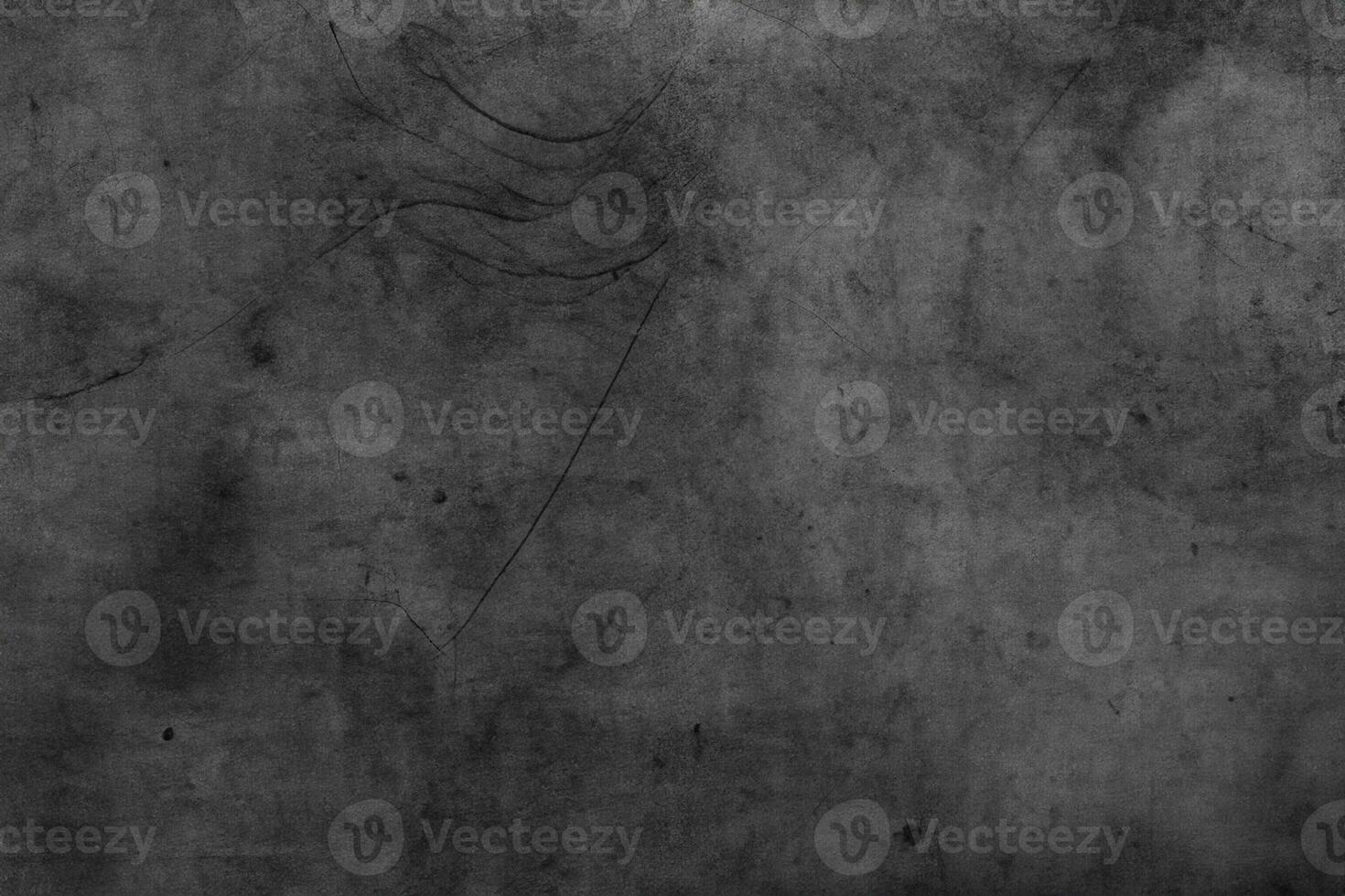 Grunge textured dark concrete wall background photo