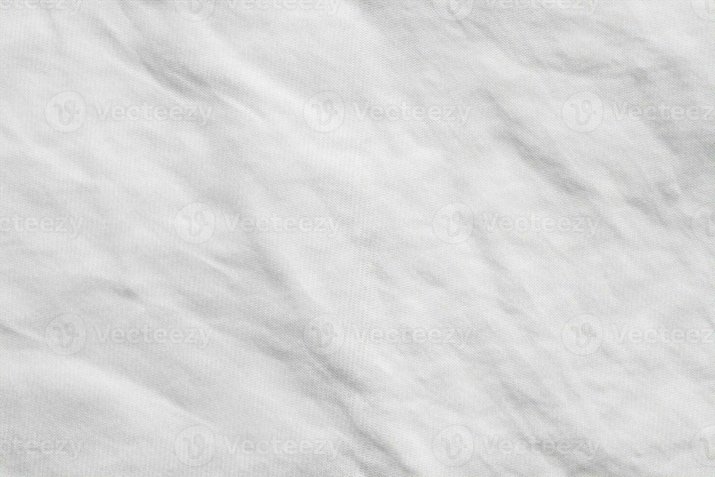 fondo de patrón de textura de tela de tela de camisa de algodón arrugado blanco foto