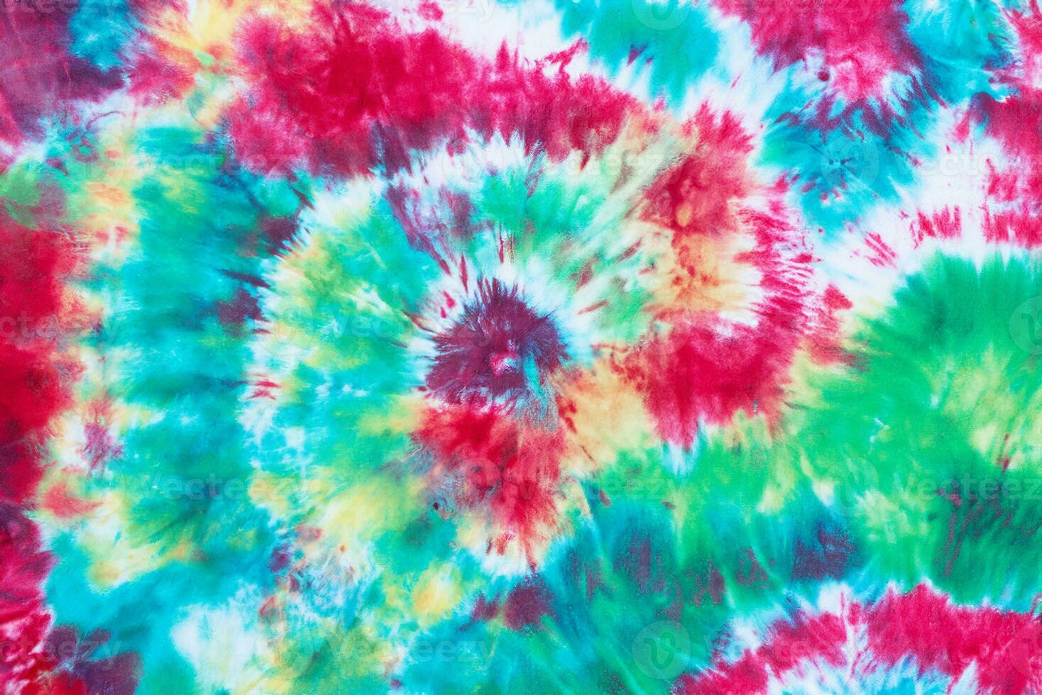 tie dye pattern hand dyed on cotton fabric abstract texture background. photo