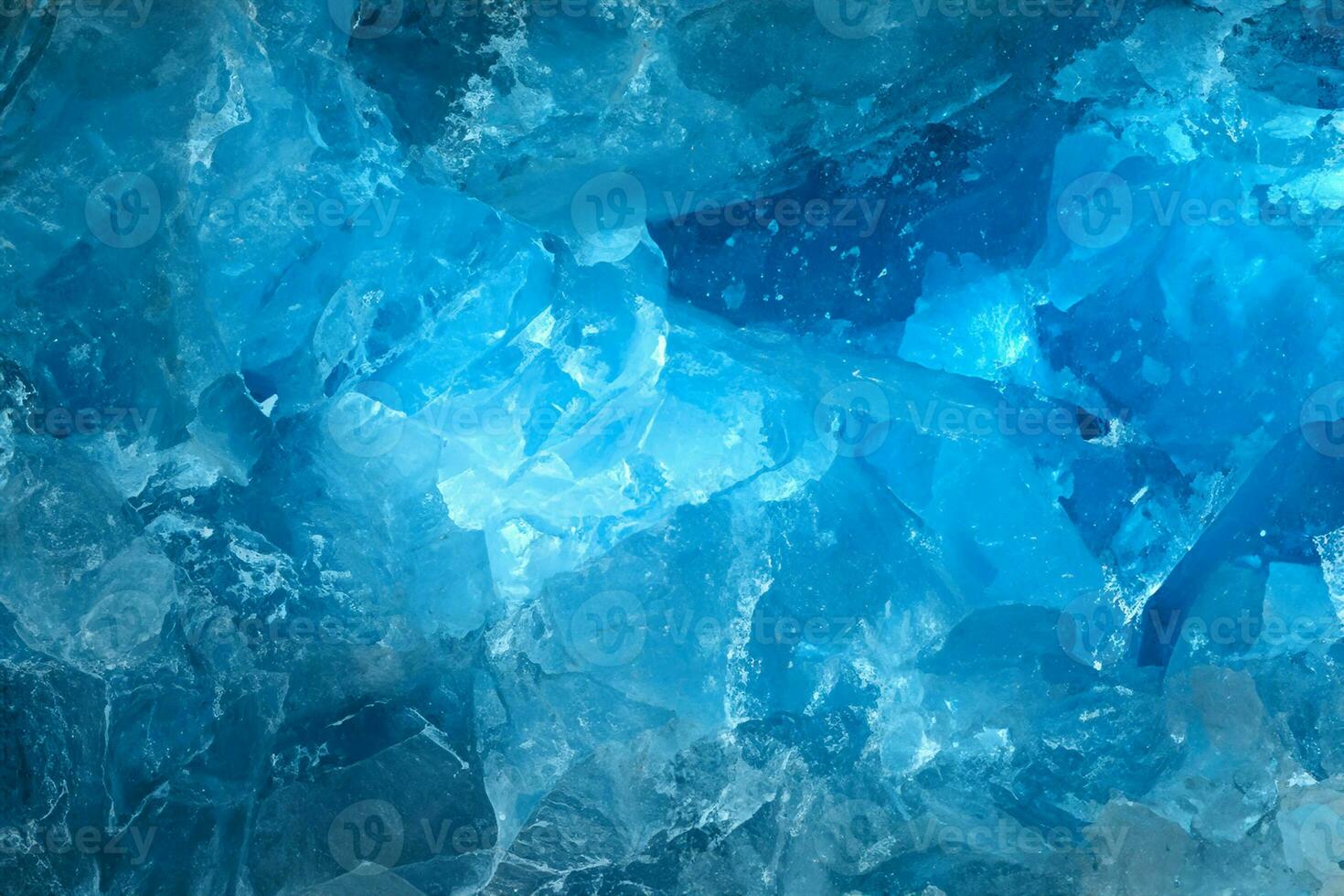 Pieces of crushed blue ice glass cracks background texture. close-up frozen water photo