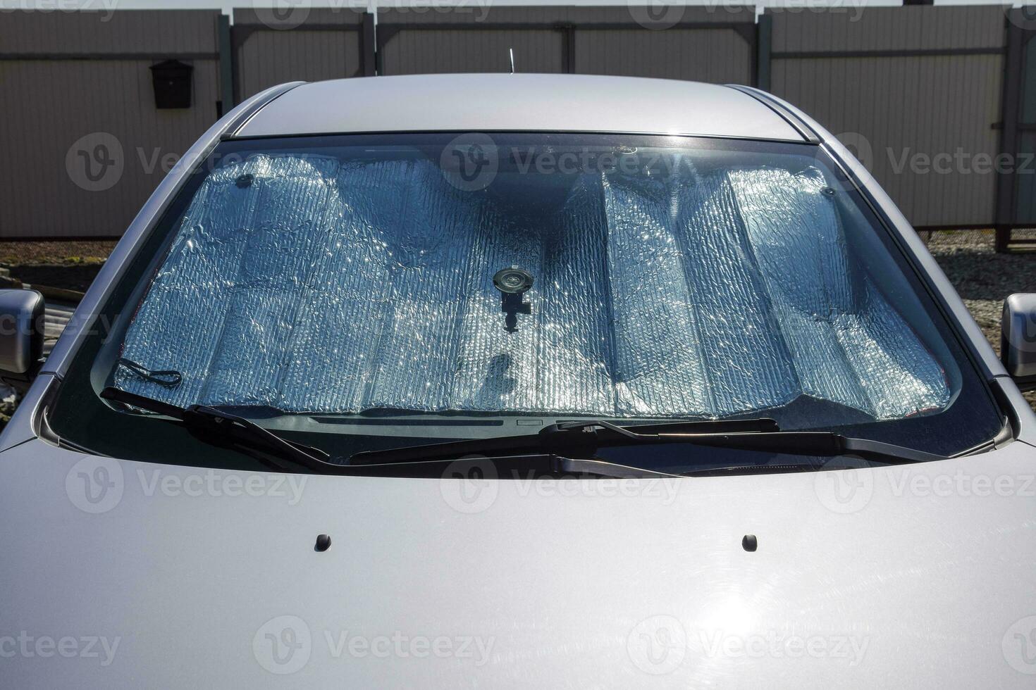 Sun Reflector windscreen. Protection of the car panel from direct sunlight photo