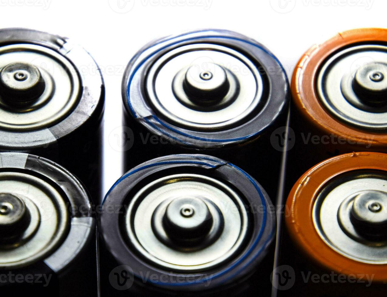 Salt and alkaline batteries, source of energy for portable technology. AAA and AA batteries photo