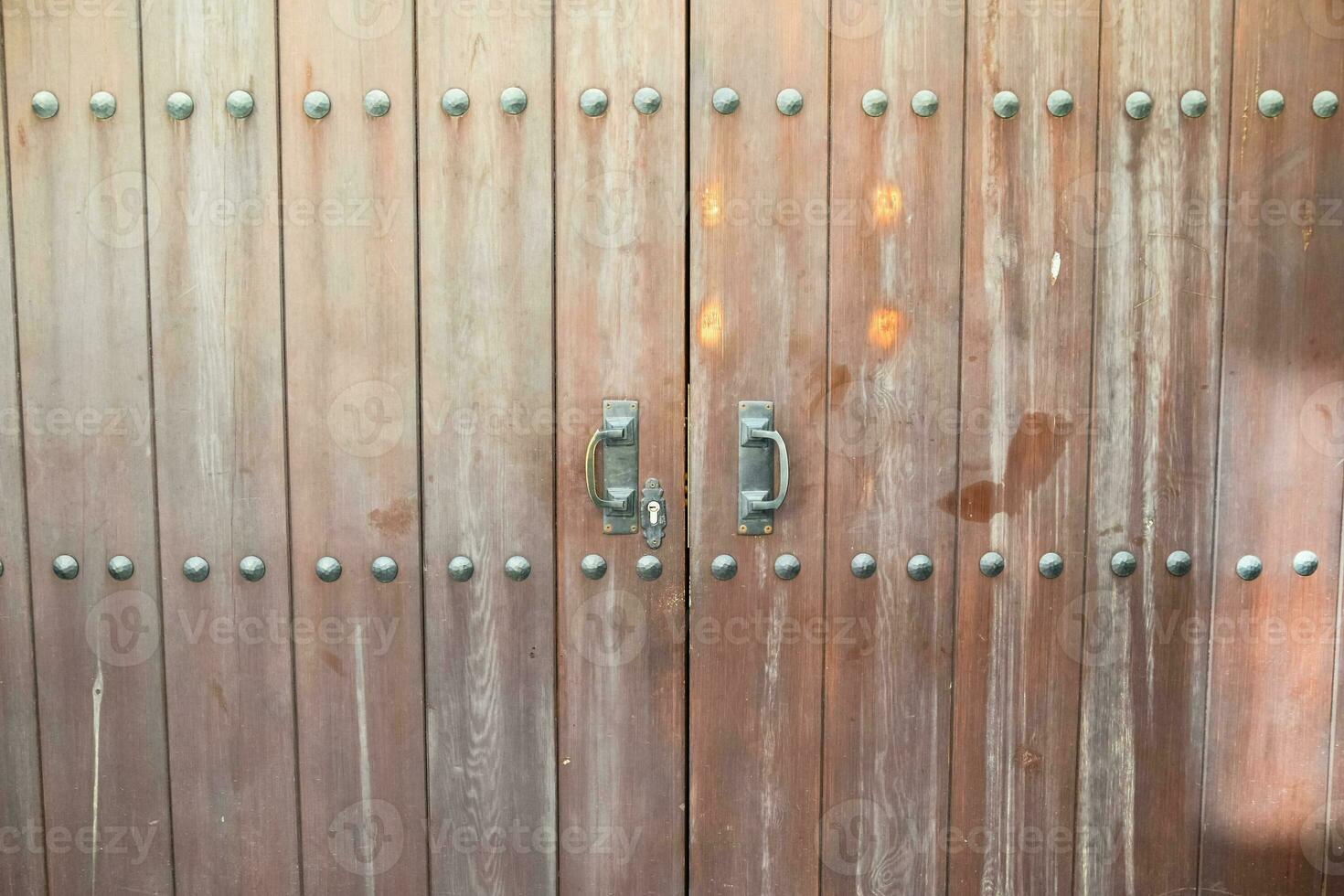 Vintage wooden gate door in old building of the historic town of Kaleici. photo