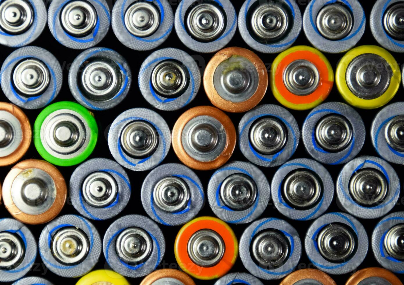 Salt and alkaline batteries, source of energy for portable technology. AAA and AA batteries photo