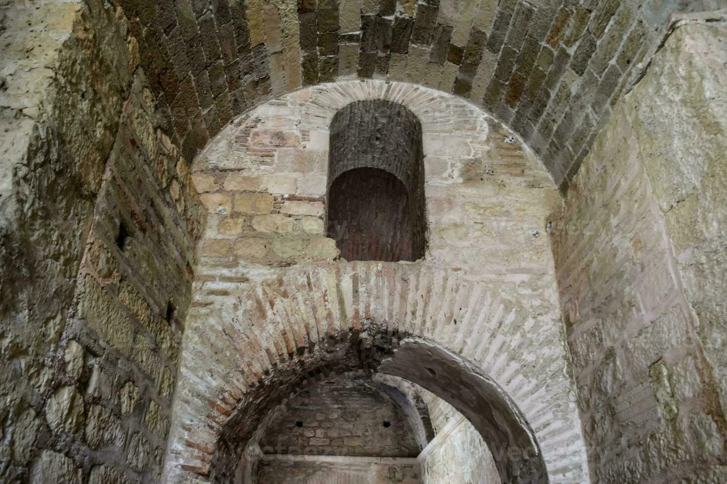 The building of Church of St. Nicholas in Turkey, Demre. Walls, columns and frescoes on the wall of the temple. photo