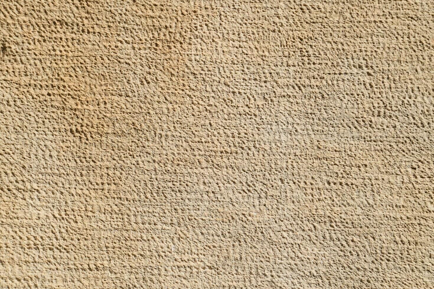 Texture of processed ancient marble block. Traces of ancient tools photo