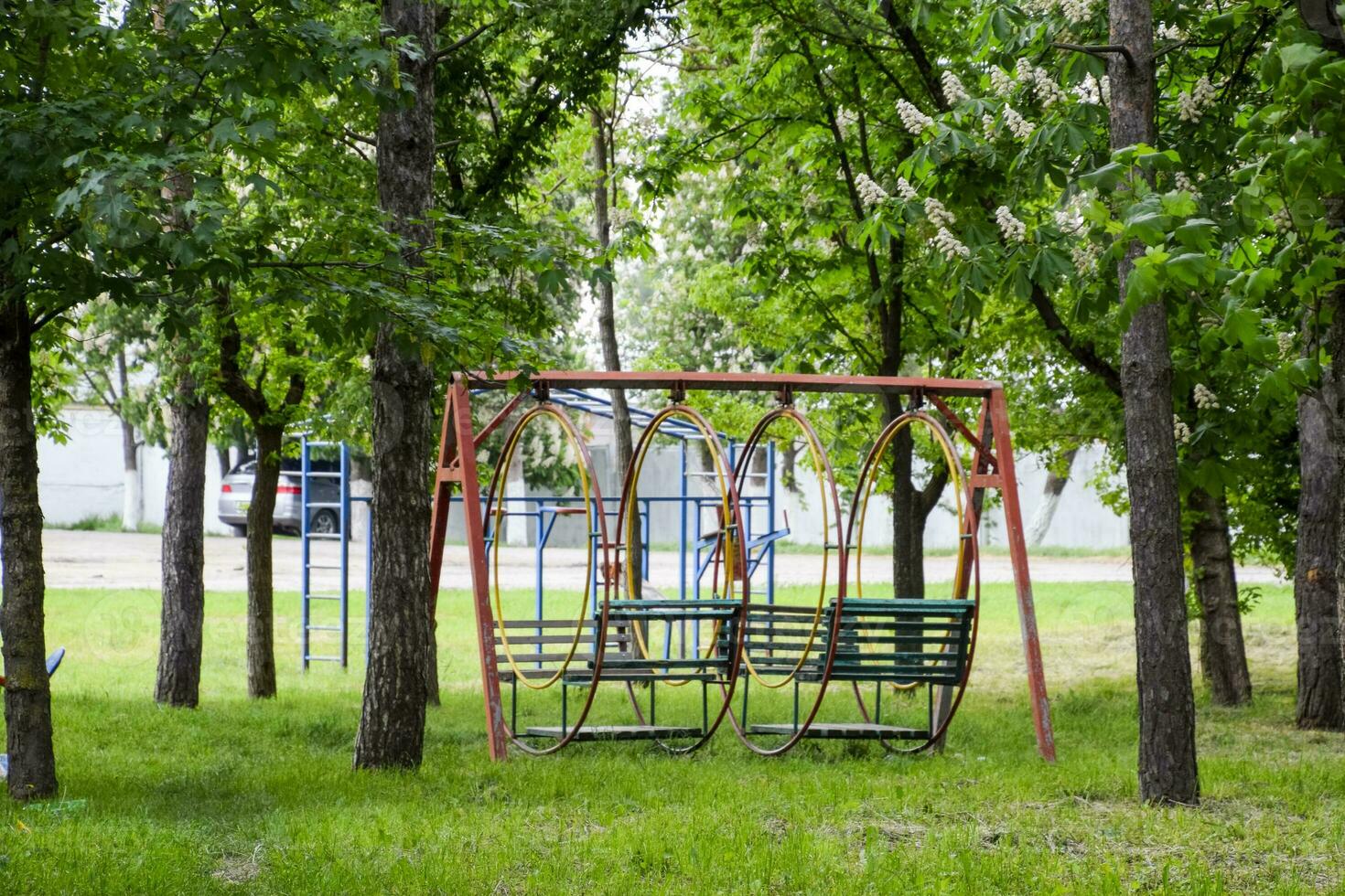 swing in the park. Playground for children's games in the park. Swing round. photo