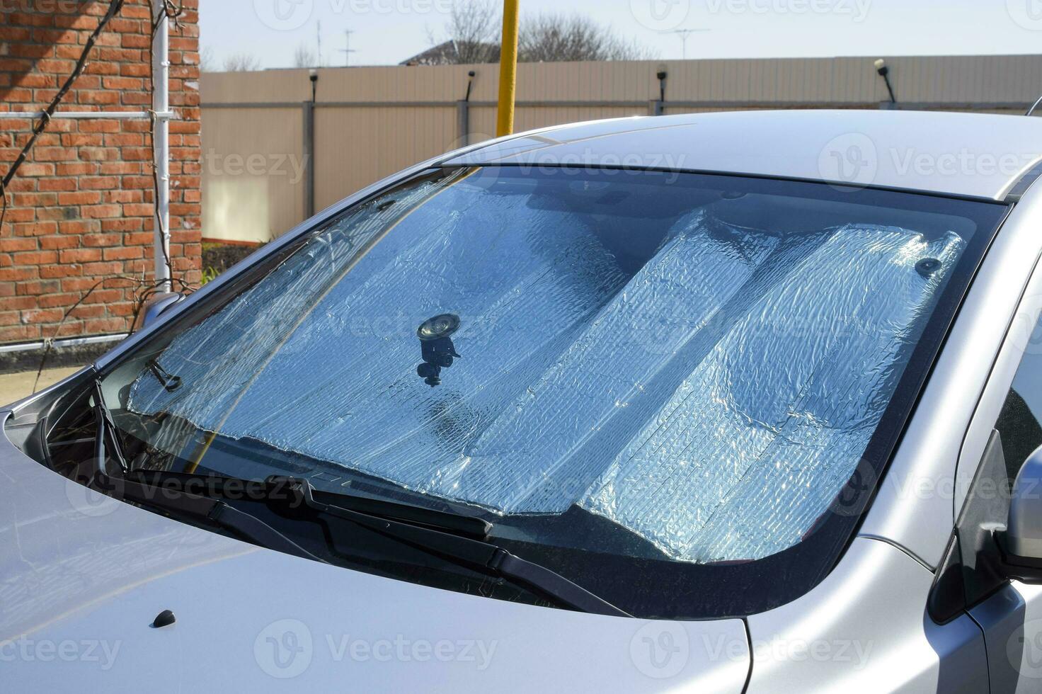 Sun Reflector windscreen. Protection of the car panel from direct sunlight photo