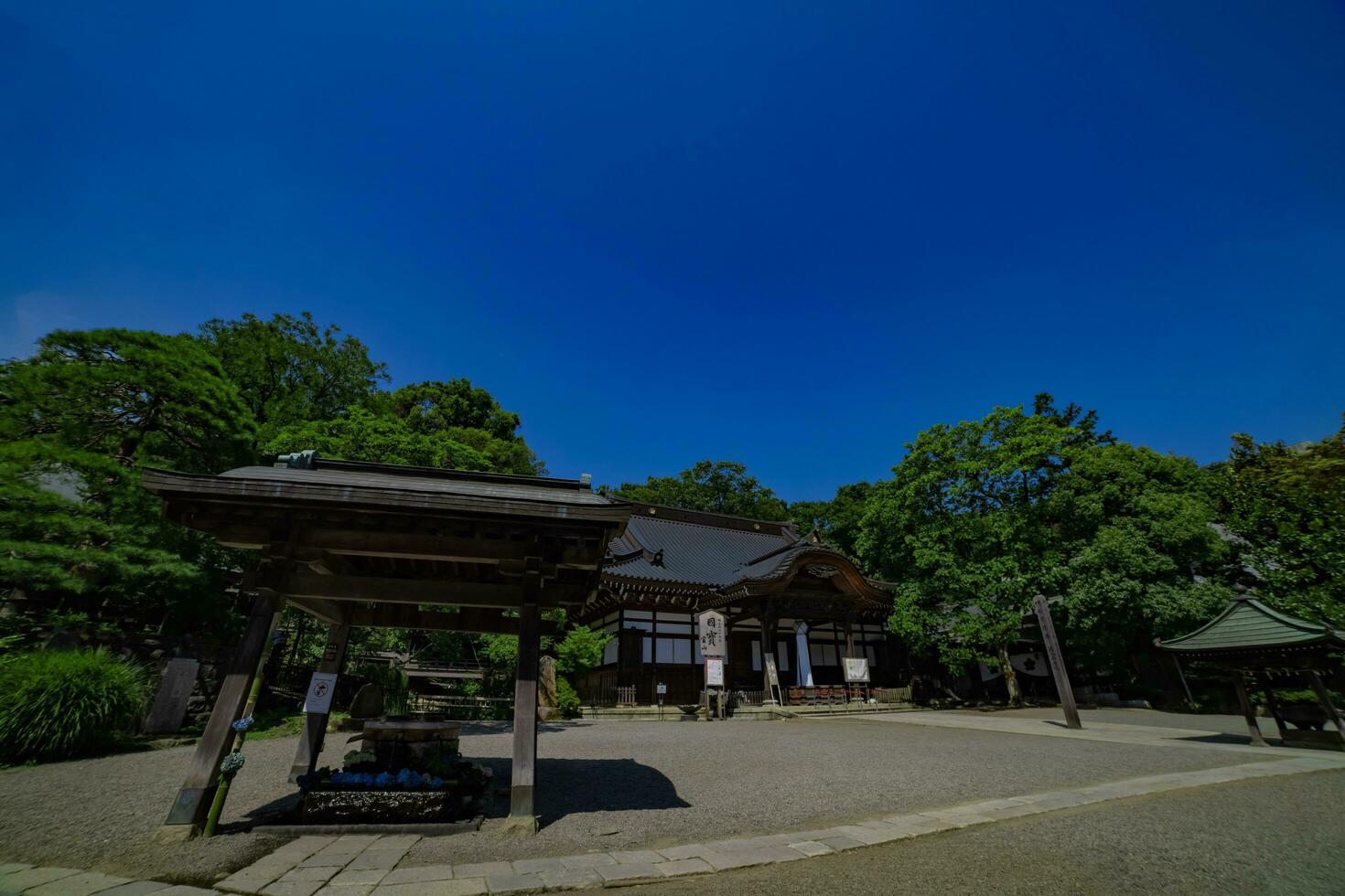 A Japanese traditional temple JINDAIJI at the old fashioned street in Tokyo wide shot photo