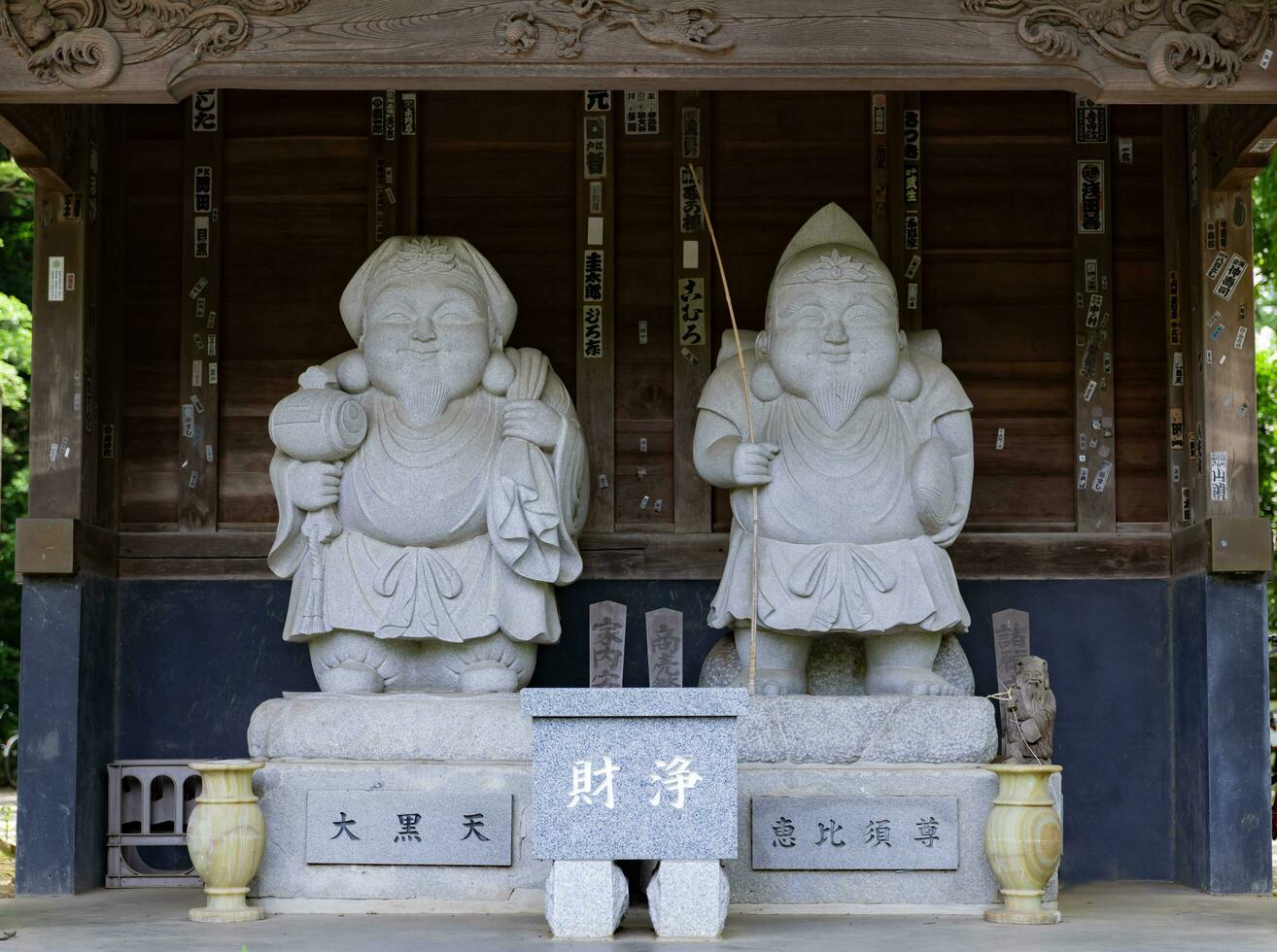 Japanese guardian statues at the traditional street in Tokyo photo