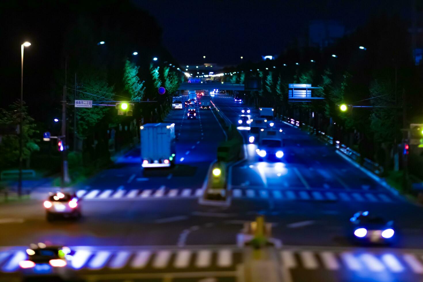 A night miniature traffic jam at the downtown street in Tokyo photo