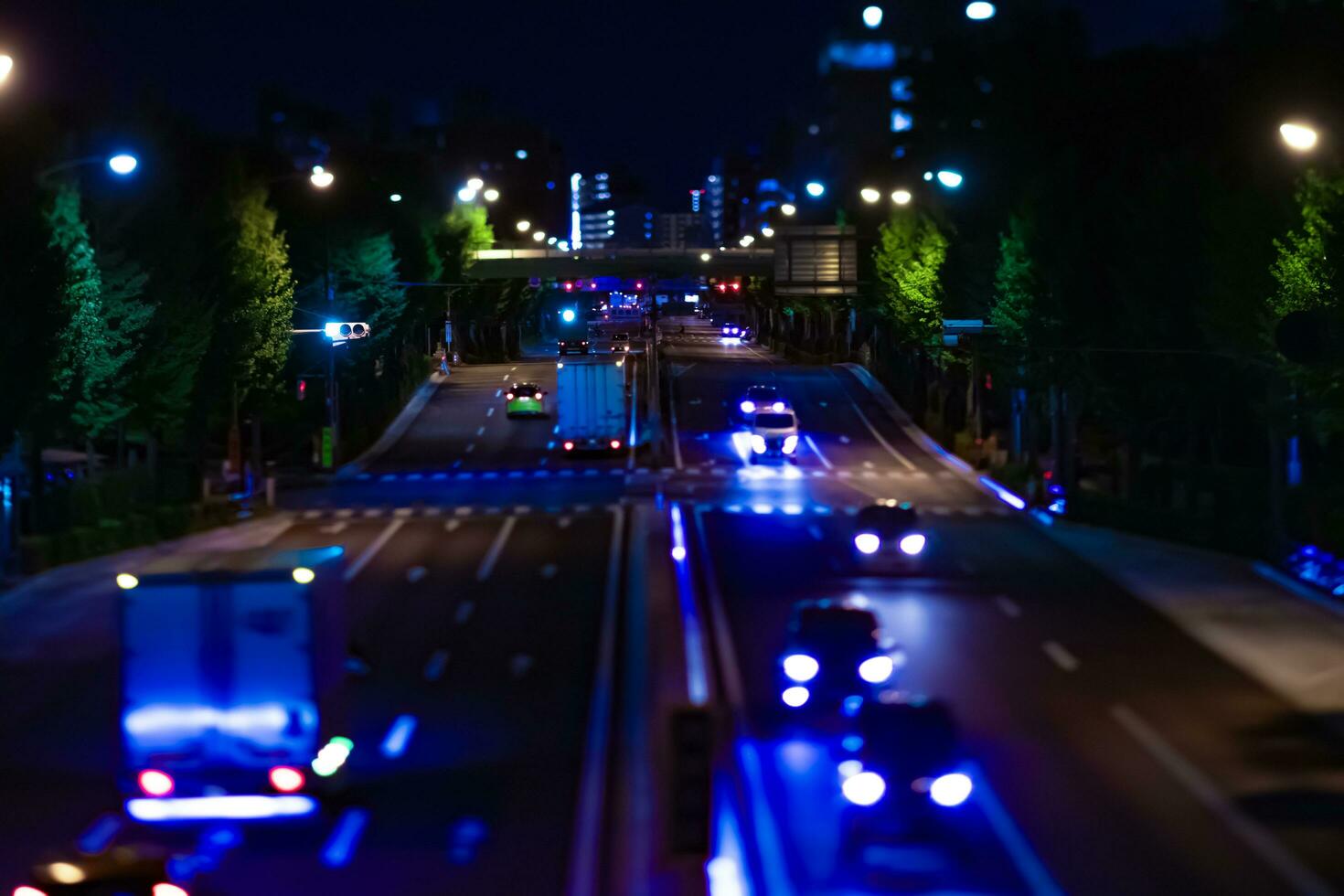 A night miniature traffic jam at the downtown street in Tokyo photo