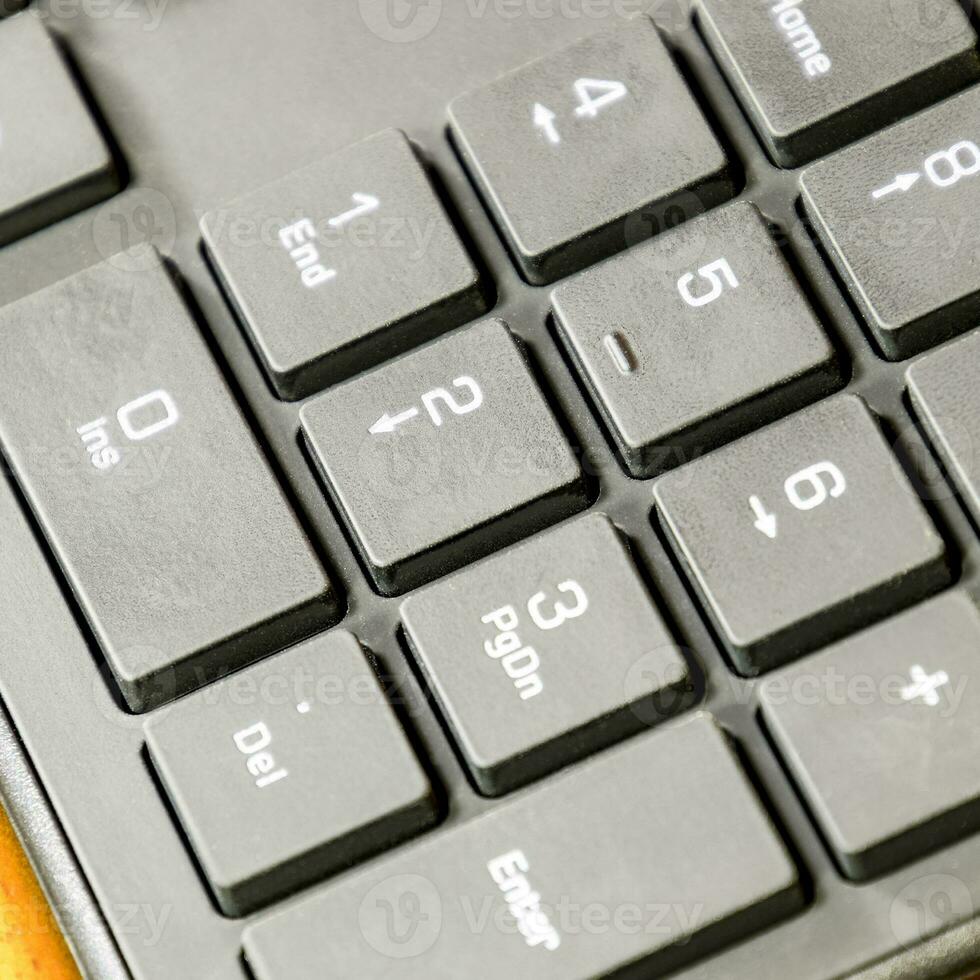 Black slim keyboard computer. A peripheral input device photo