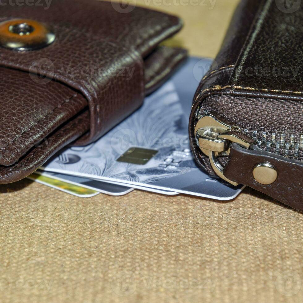 Brown leather wallet with credit and discount cards photo