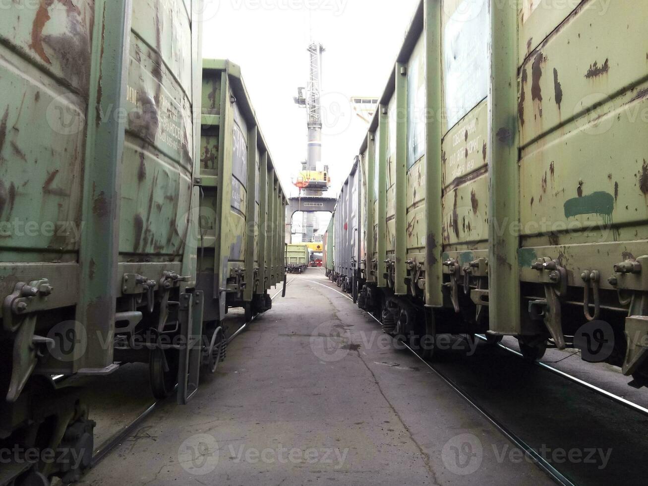 Passage between Freight rail cars. Freight cars in the port. photo