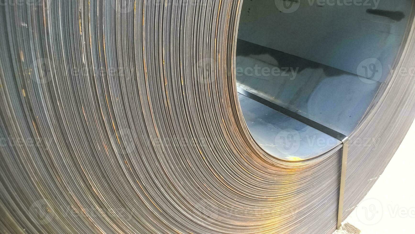 Steel sheets rolled up into rolls. Export Steel. Packing of stee photo