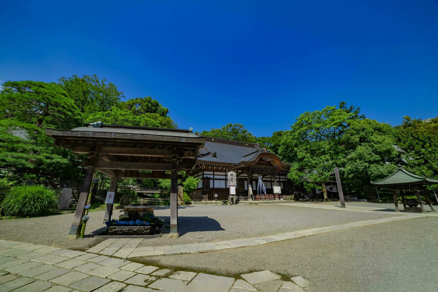 A Japanese traditional temple JINDAIJI at the old fashioned street in Tokyo wide shot photo