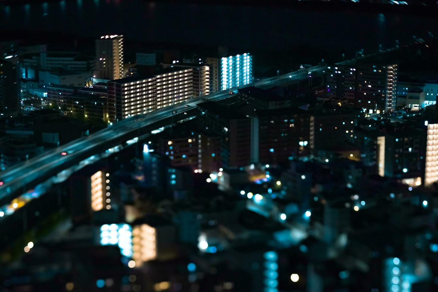 A night miniature cityscape near the highway in Osaka photo