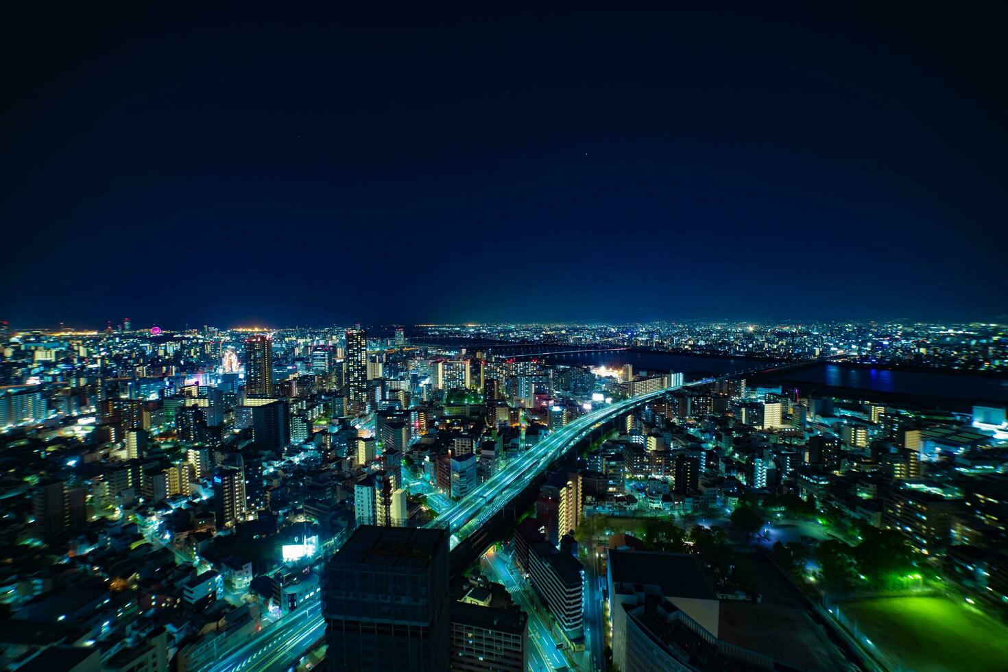 A night cityscape near Yodo river in Osaka wide shot photo