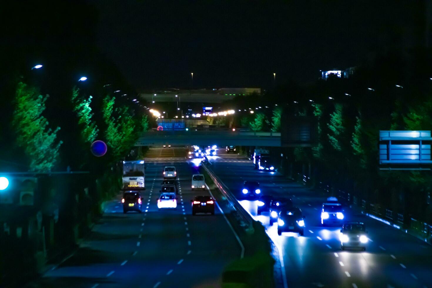A night traffic jam at the downtown street in Takashimadaira Tokyo telephoto shot photo