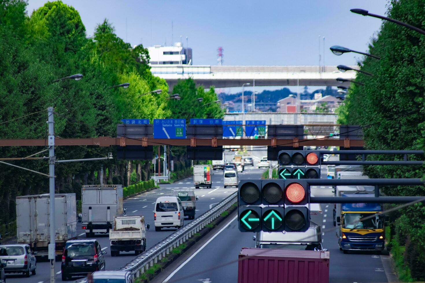 A traffic jam at the downtown street in Takashimadaira Tokyo telephoto shot photo