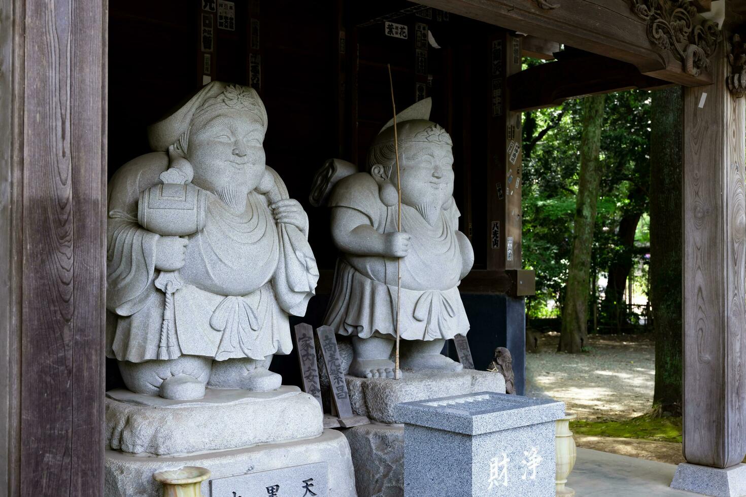 Japanese guardian statues at the traditional street in Tokyo photo