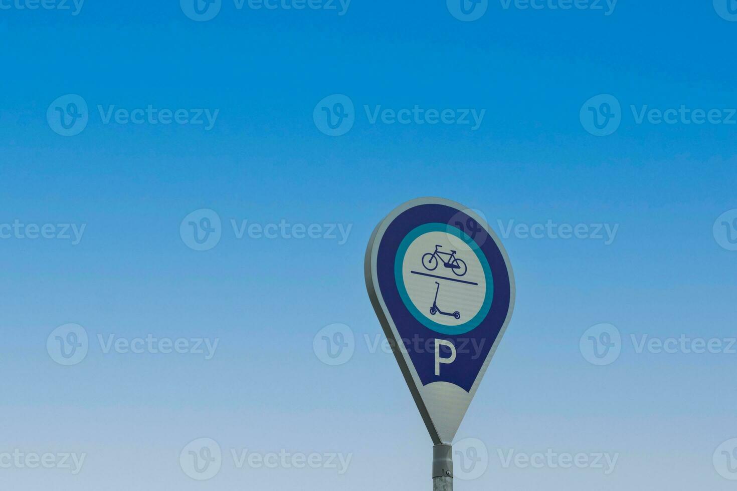 Bike and electric scooter or e-scooter parking sign photo