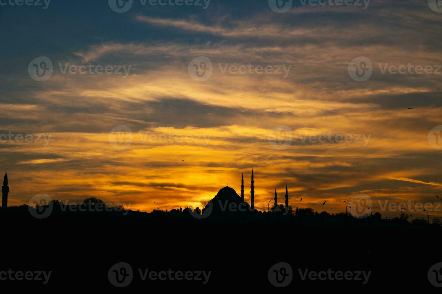 Suleymaniye Mosque and dramatic clouds at sunset. Ramadan or islamic concept photo