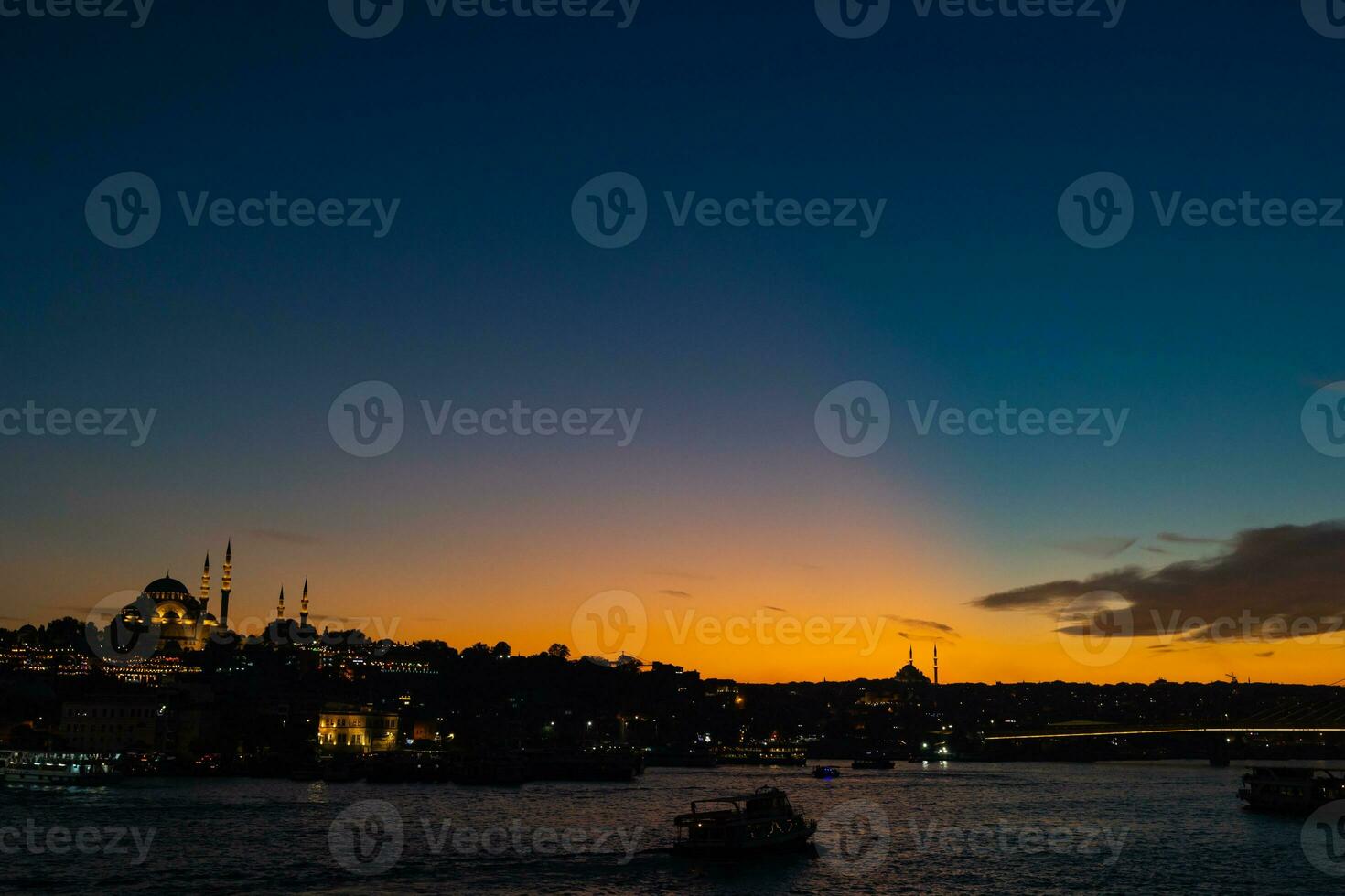 Istanbul photo. Suleymaniye Mosque and Golden Horn at sunset from Galata Bridge photo